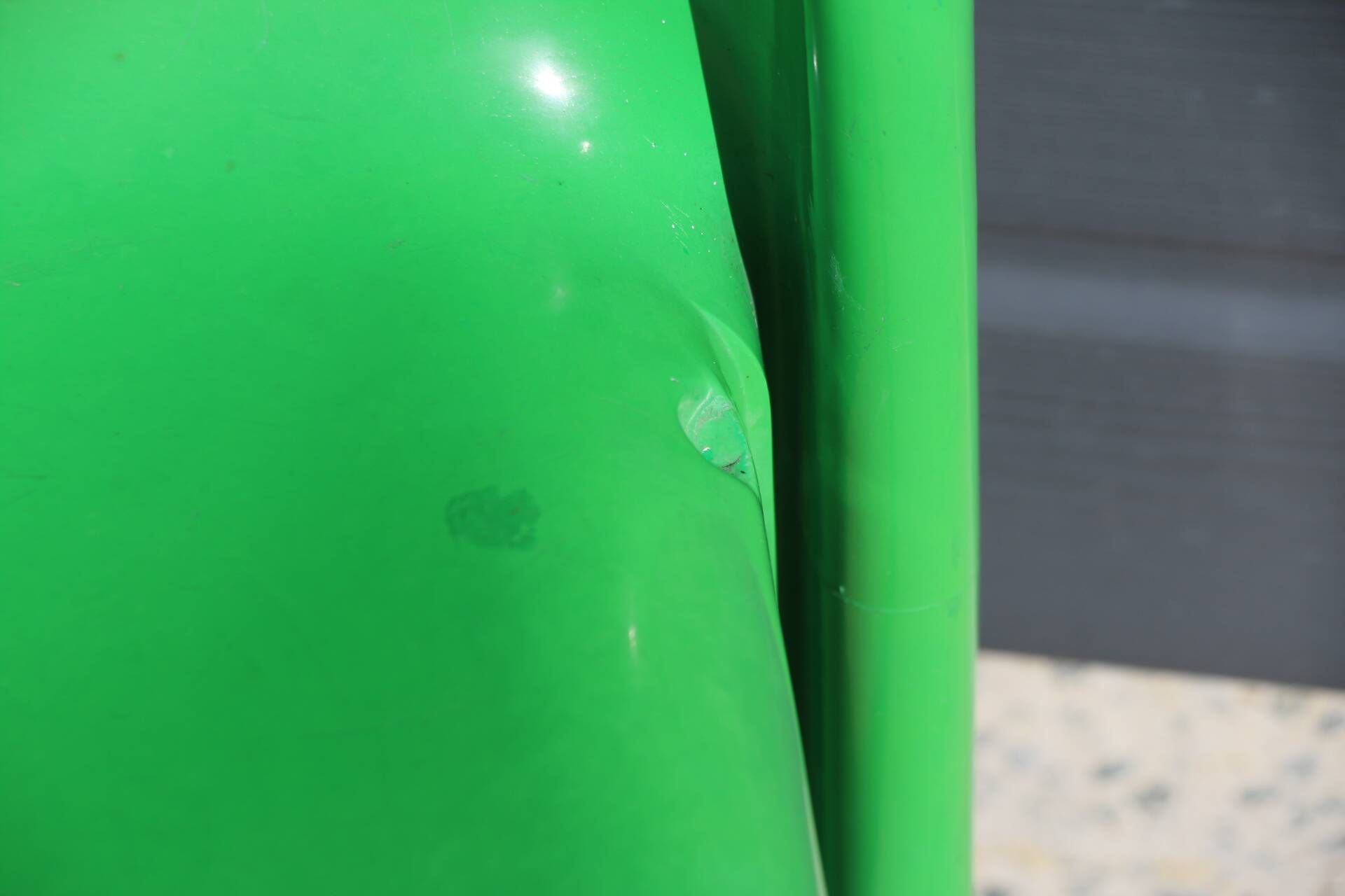 Set of 4 green Selene Magistretti chairs.