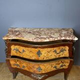 Louis XV style commode with floral marquetry decoration.