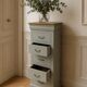 Louis-Philippe style chiffonnier in grey-green, wooden top.
