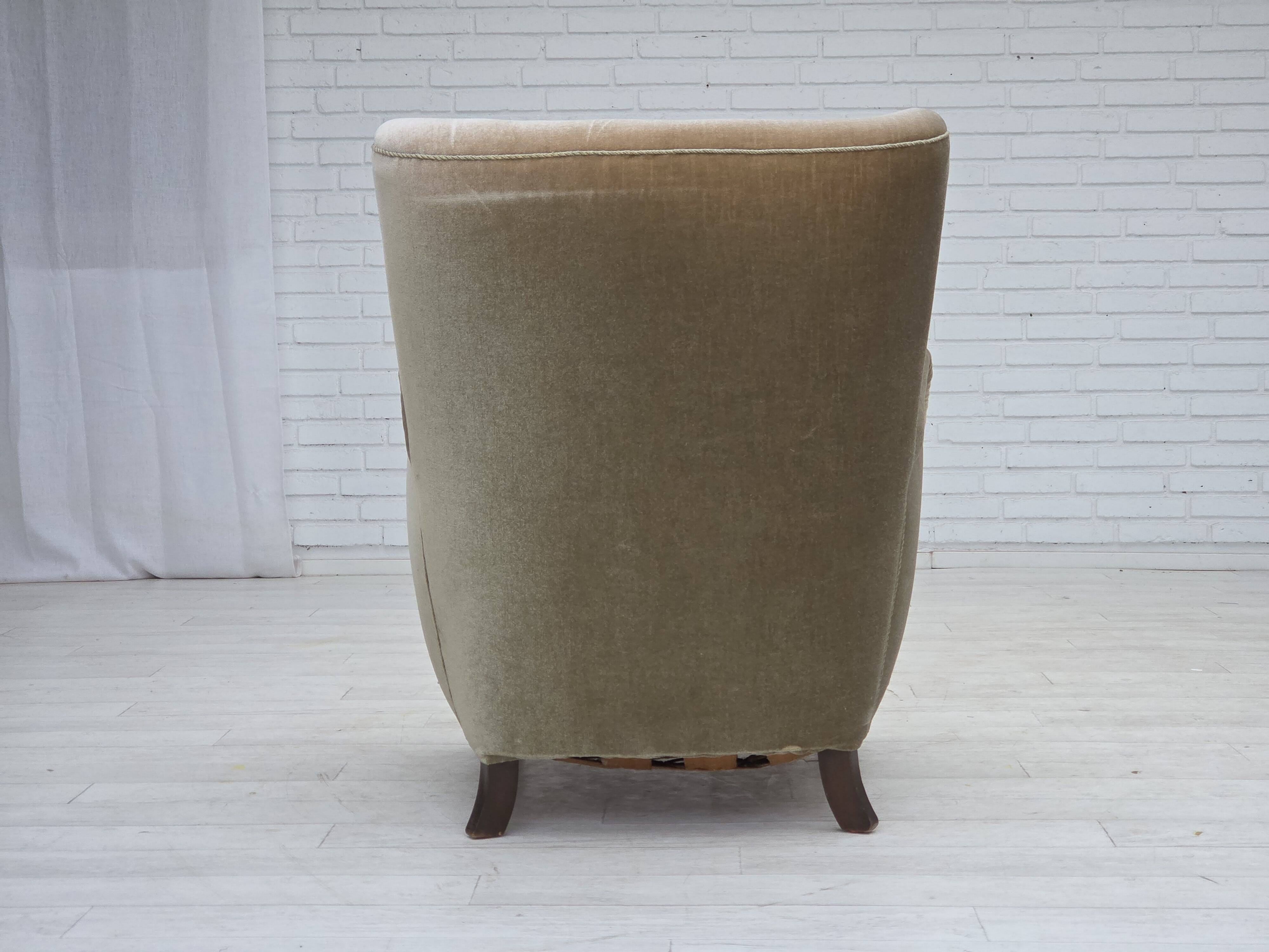 1960s, Danish armchair, green furniture velour, oak wood legs.