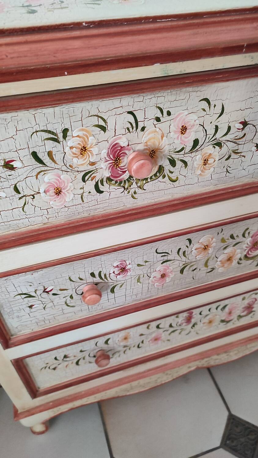 Painted chest of drawers with floral decoration