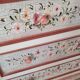Painted chest of drawers with floral decoration