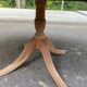 Round extendable dining table Regency central leg stripped mahogany 1960