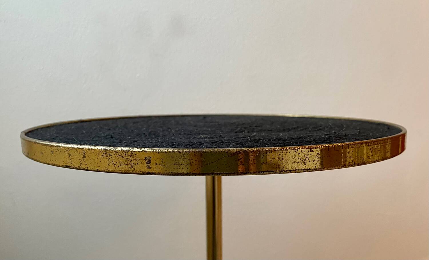 Vintage tripod pedestal table in gold metal