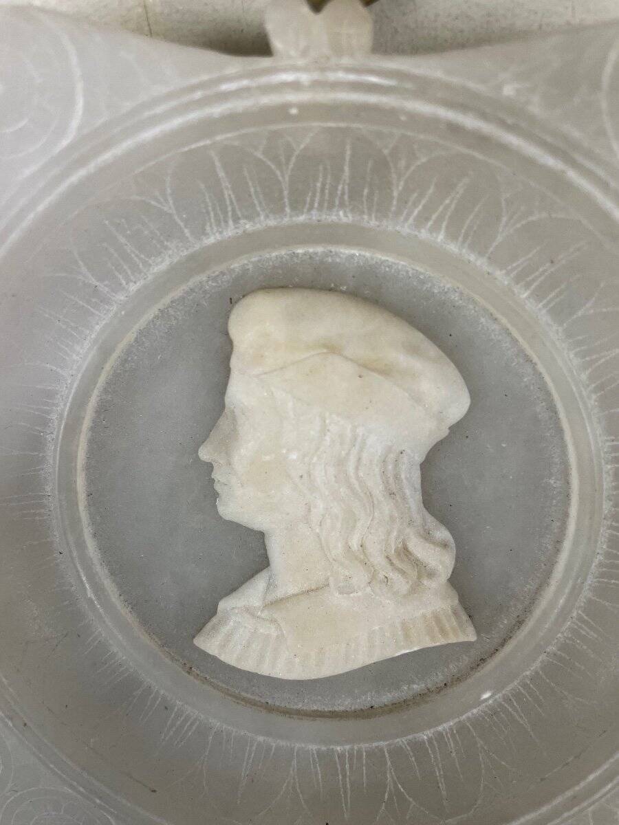Three alabaster profiles of men, Italy around 1880