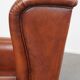 Fauteuil à oreilles de style anglais en cuir de vachette
