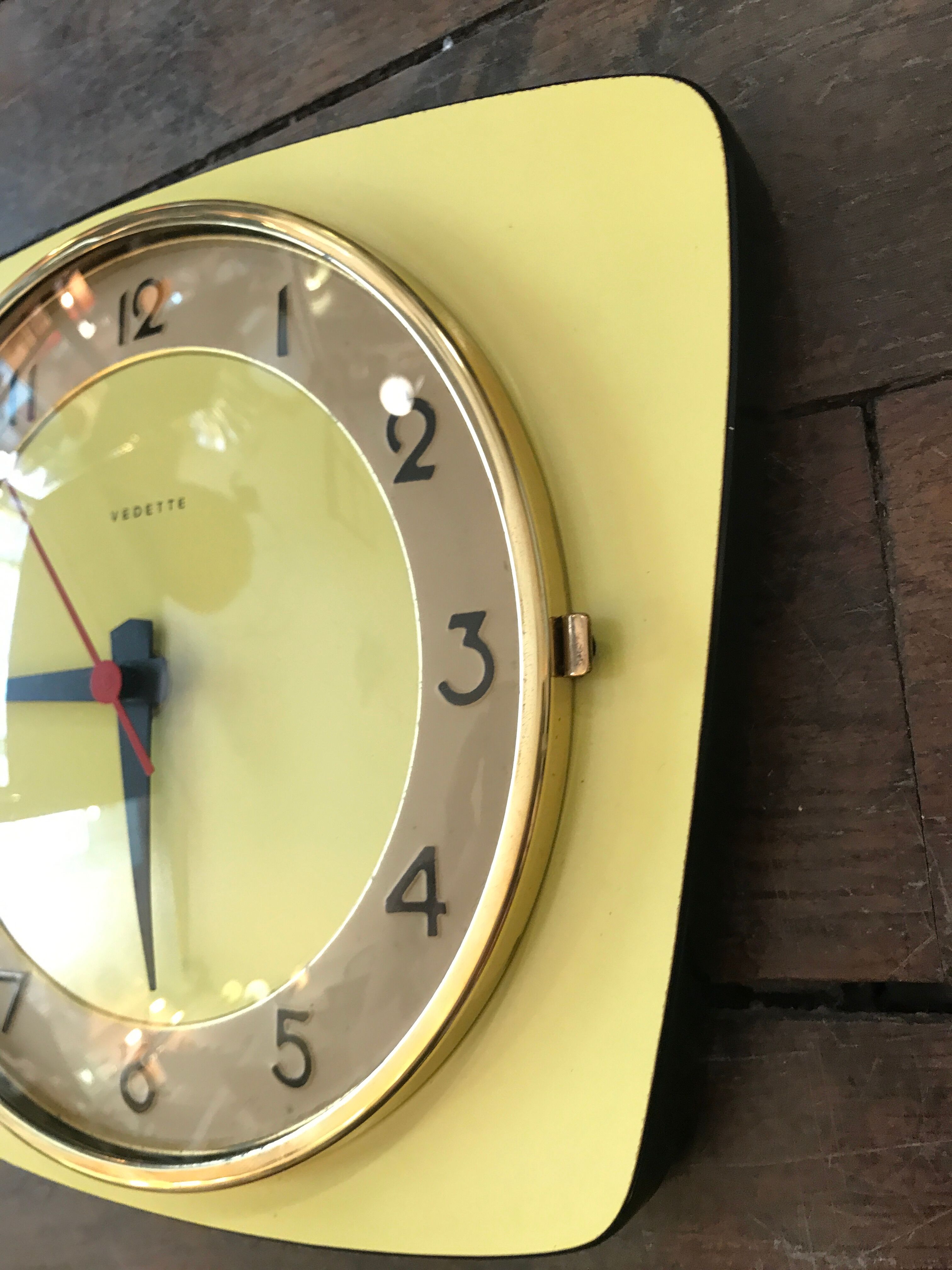 Vintage clock star Formica yellow wall pendulum