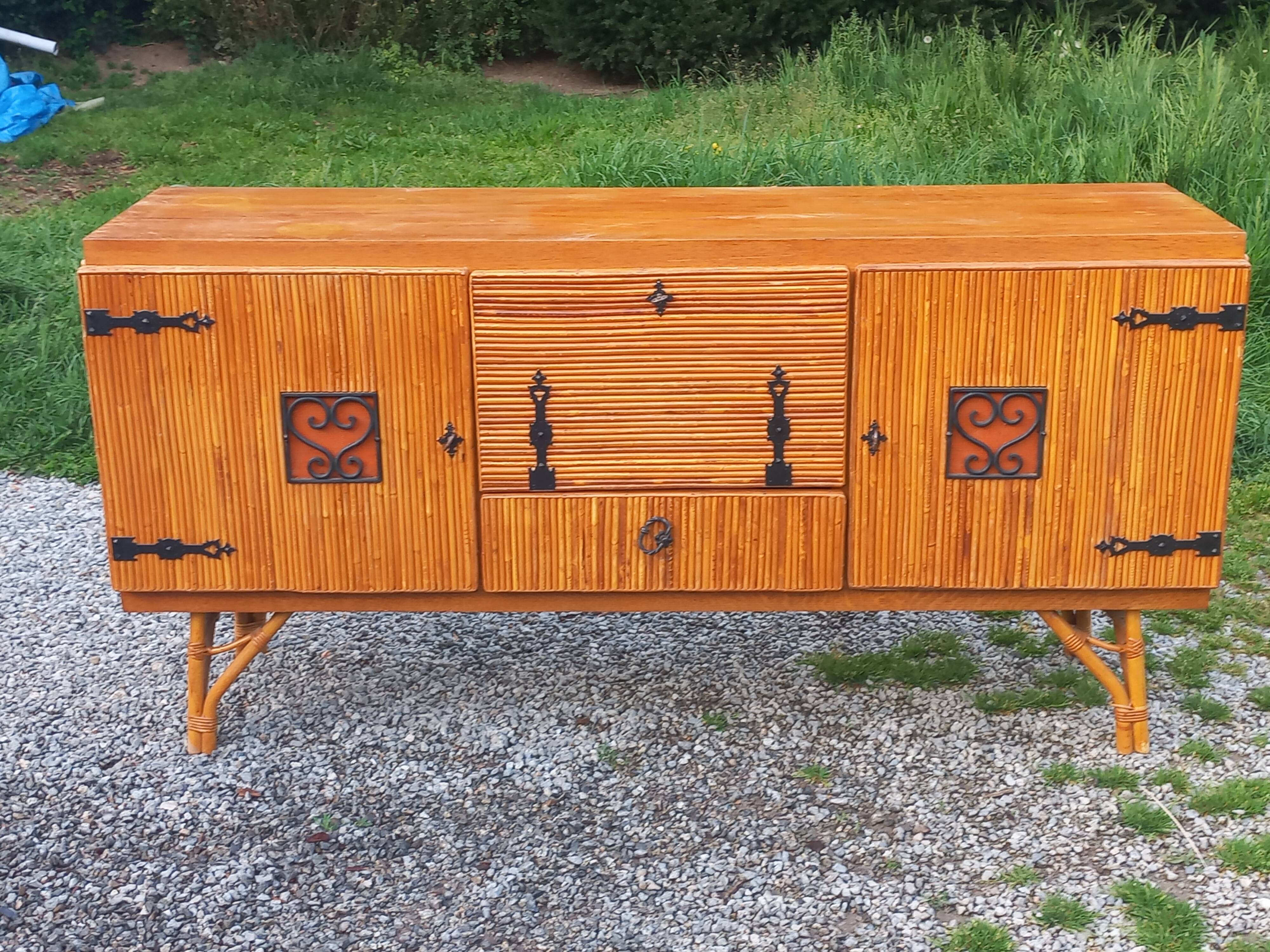 Bamboo and rattan enfilade attributed to Audoux and Minet.