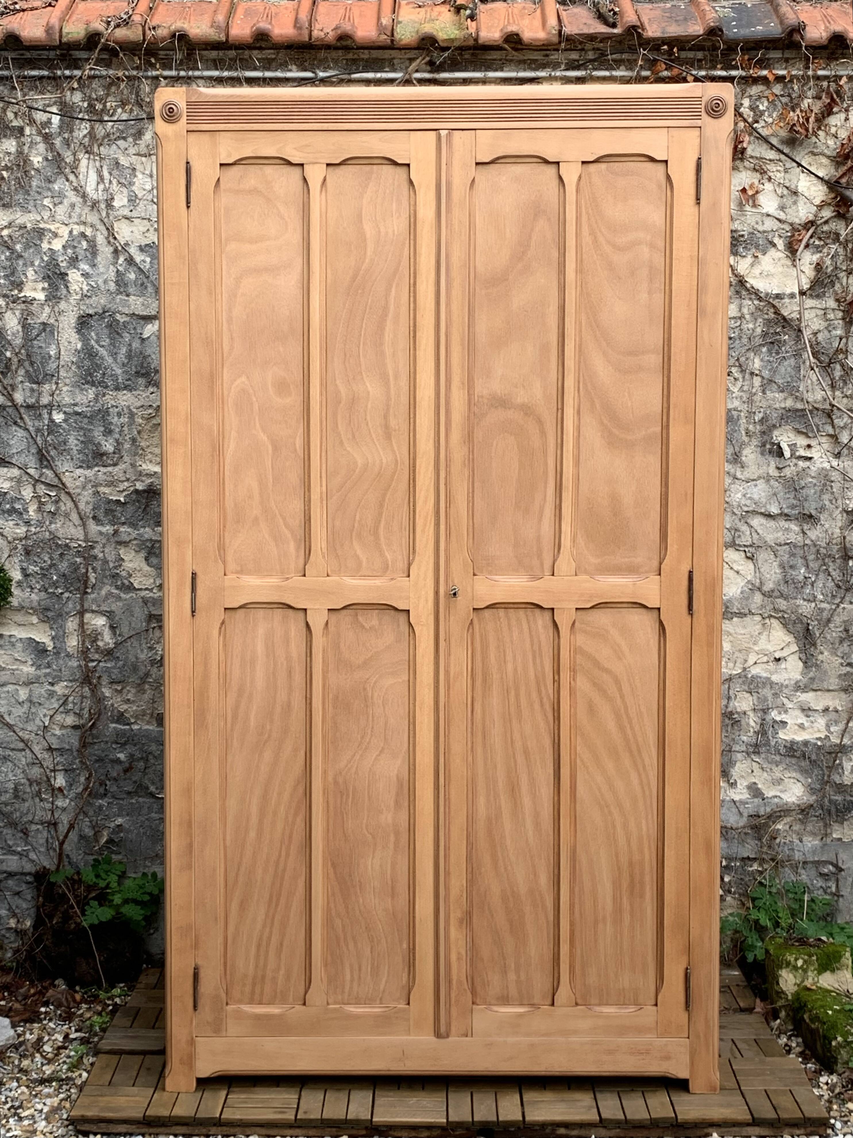 Parisian paneled cabinet in raw wood, 1940