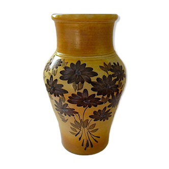 Sandstone vase with floral decoration