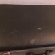 Antique vintage black upholstered vintage suitcase