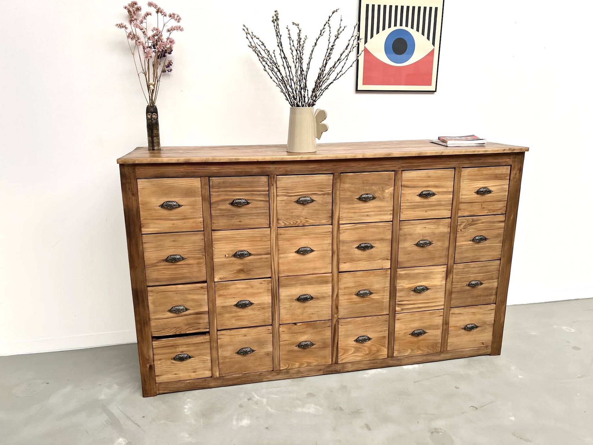 Craftsman's cabinet with 24 drawers in solid pine, 1950s.
