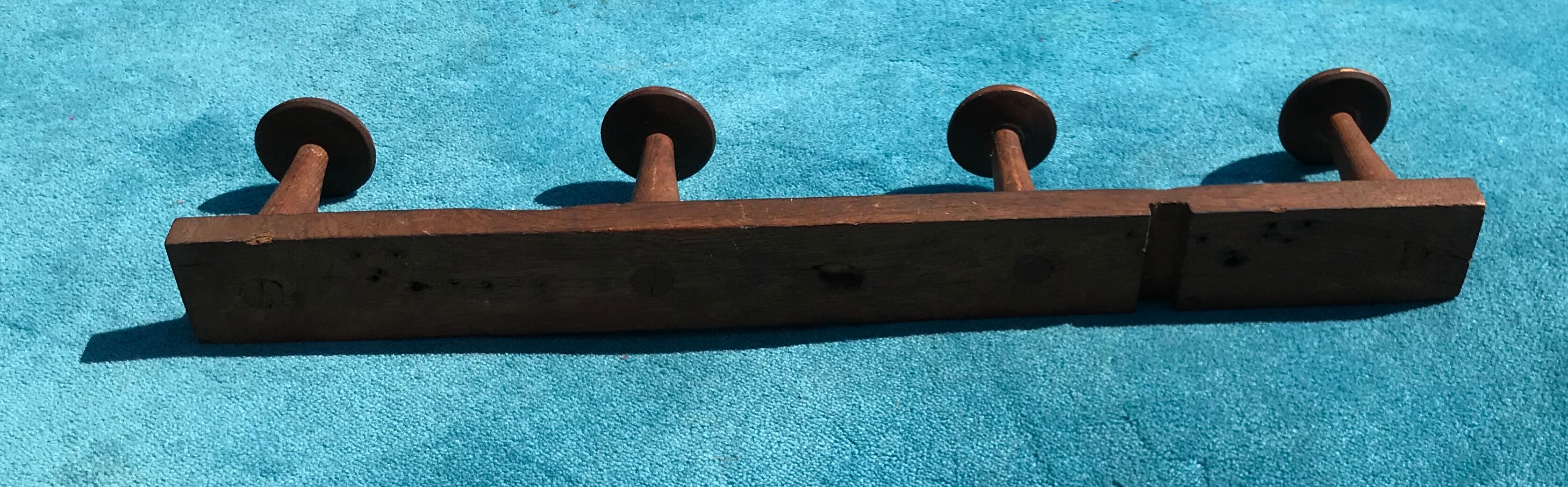 Wooden wall coat holder