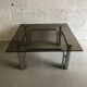 Table basse verre fumé et métal chromé années 70