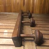 Old coat rack with 4 vintage wooden hooks