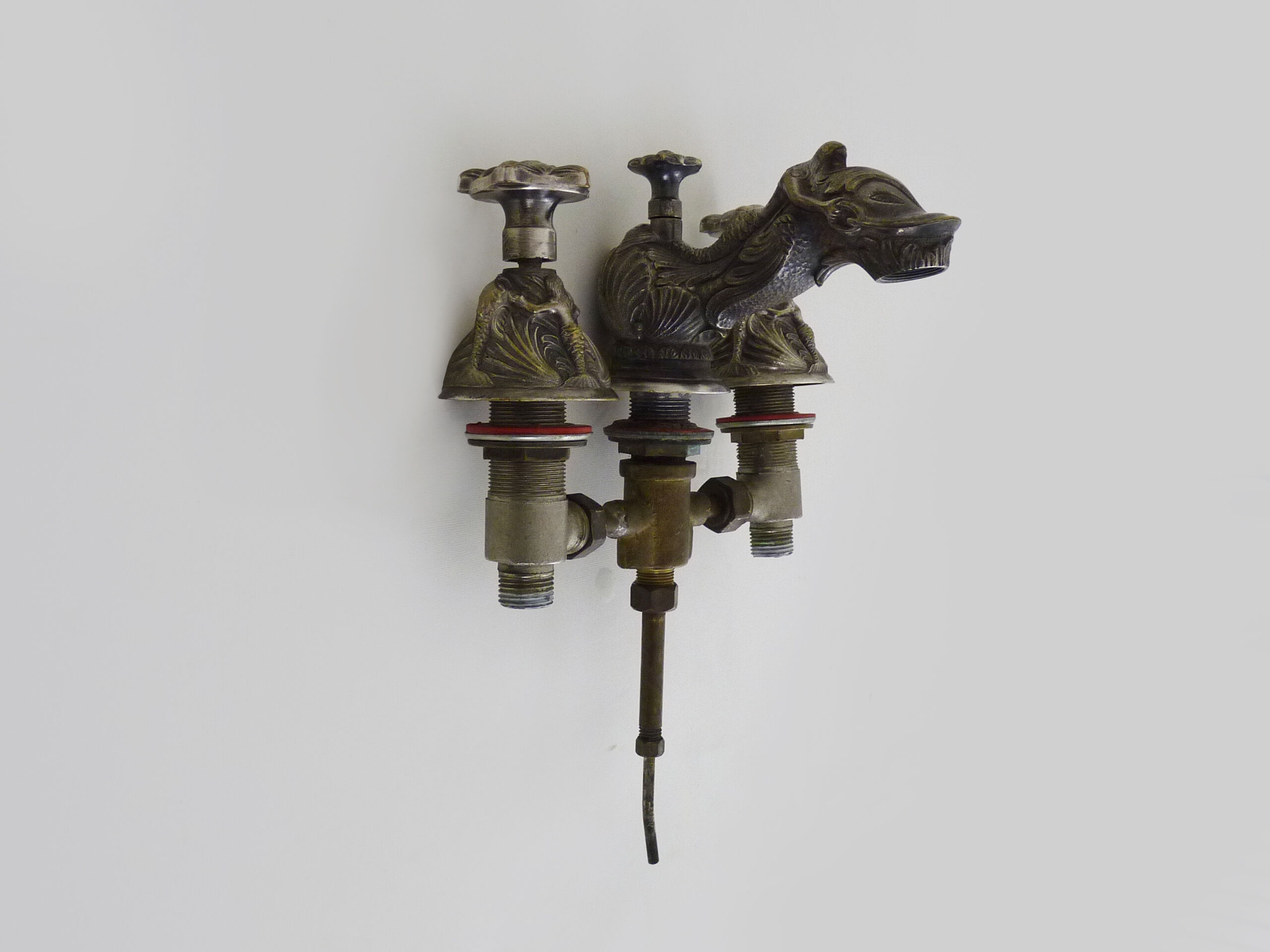 Old bathtub faucet, silver bronze kitchen with dolphin head and mermaid