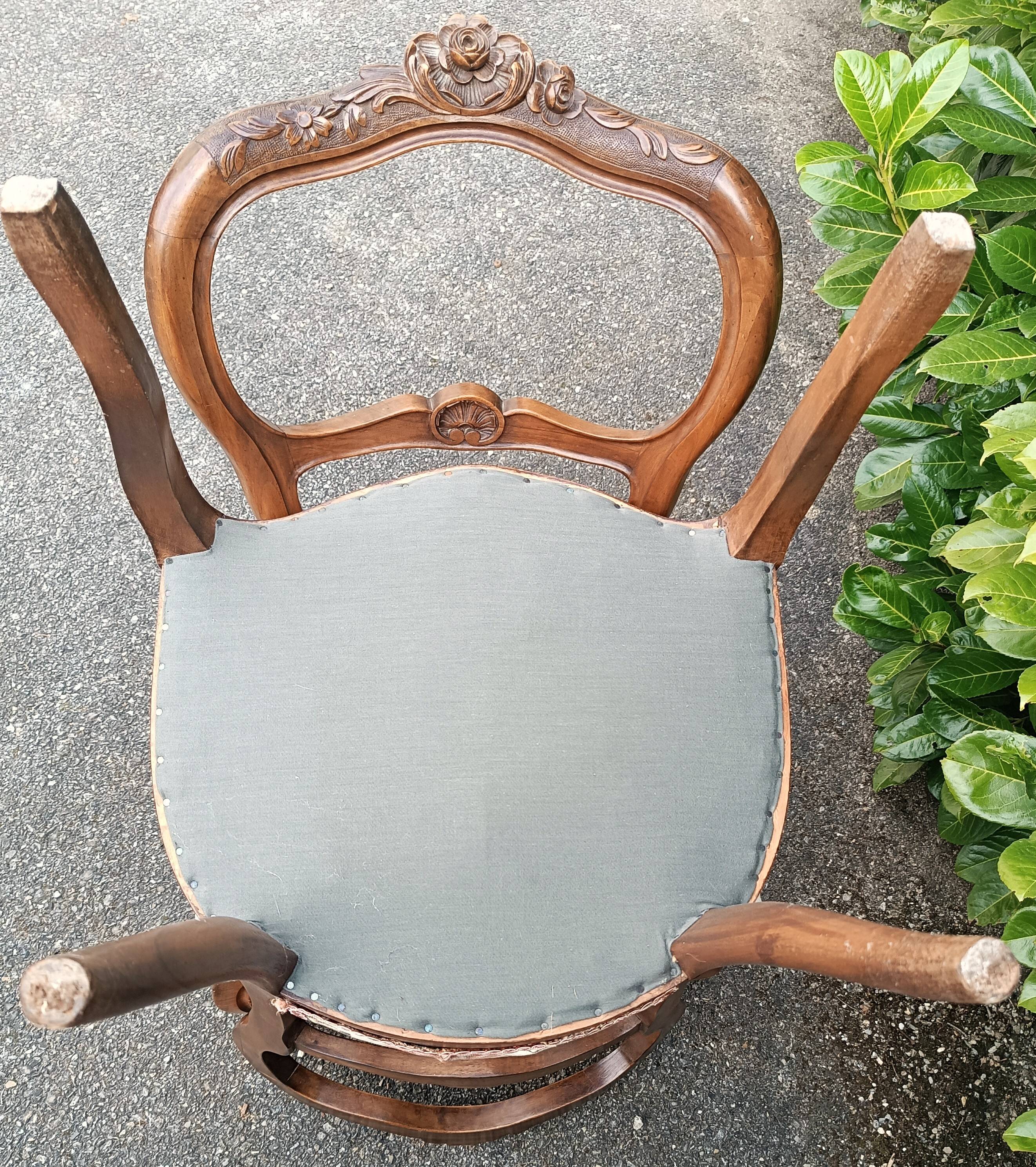 Pair of Louis XV chairs in carved walnut.