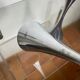 Pair of designer candle holders in stainless steel