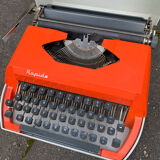 Machine à écrire rapido grise et orange