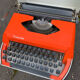 Grey and orange rapido typewriter