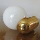 Pair of appliques " Limburg " white opaline and golden methacrylate 80s