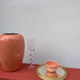 Round mirror in gold metal