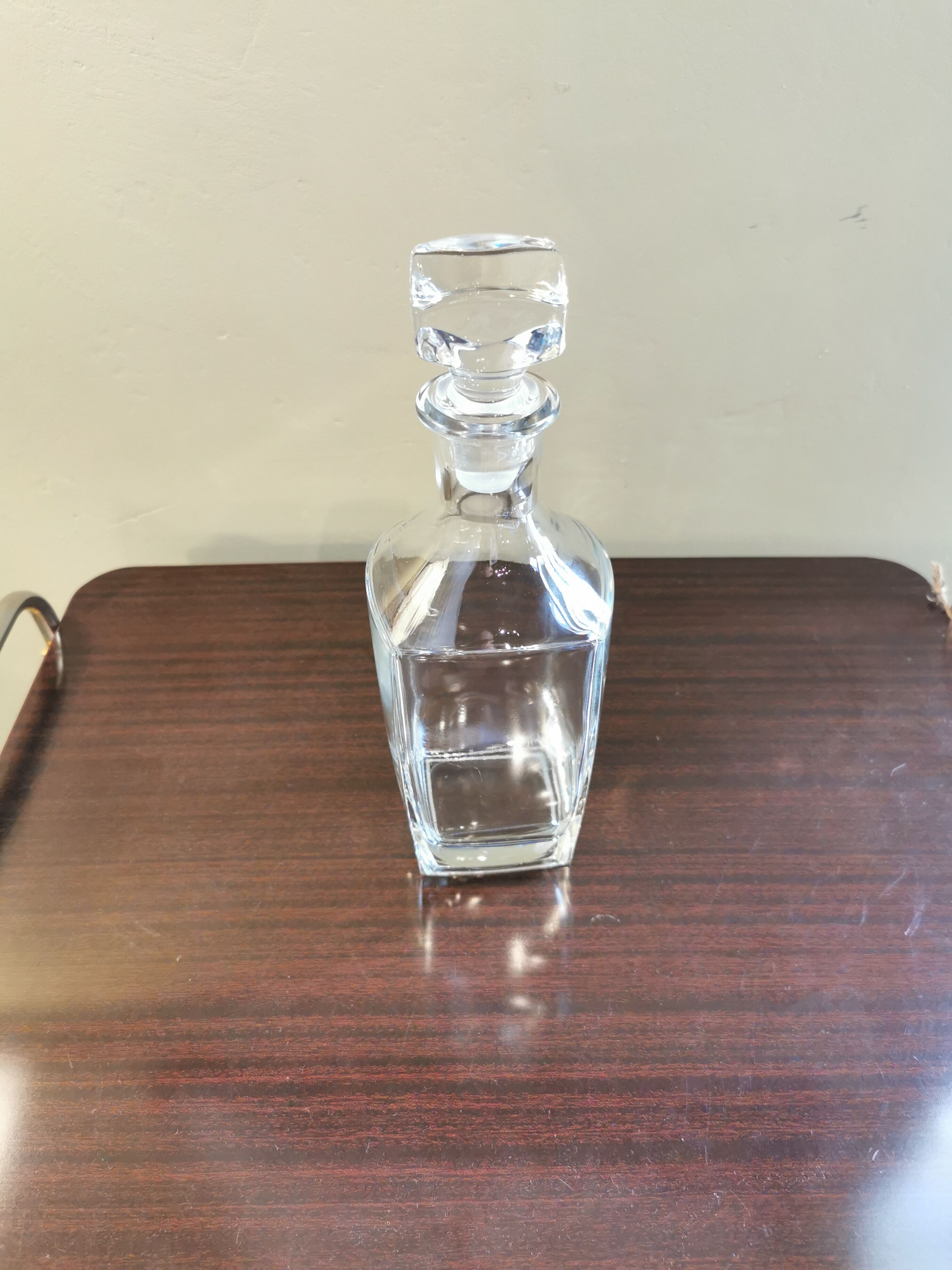 Square vintage decanter made of transparent glass