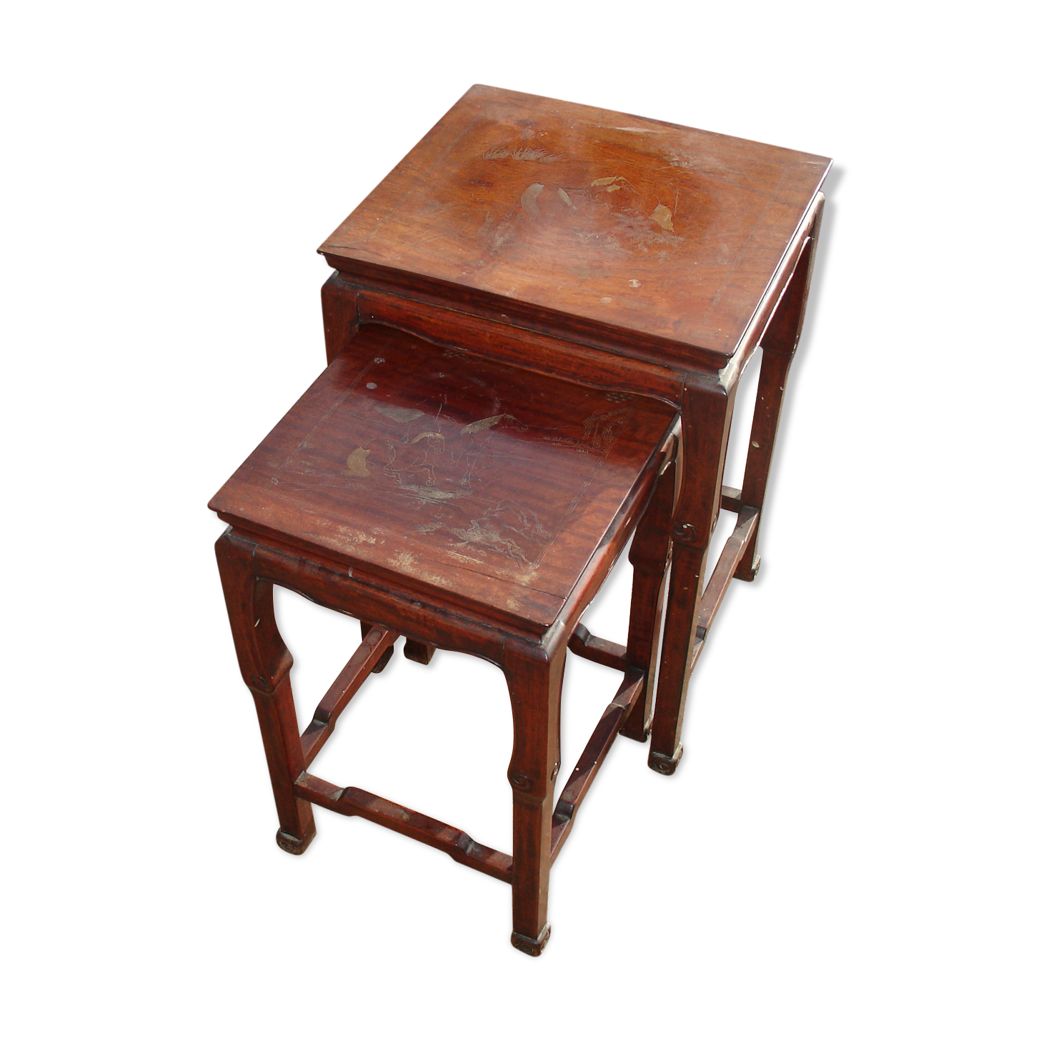 Nesting tables in ironwood with engraved decoration and gold highlights