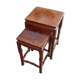 Nesting tables in ironwood with engraved decoration and gold highlights