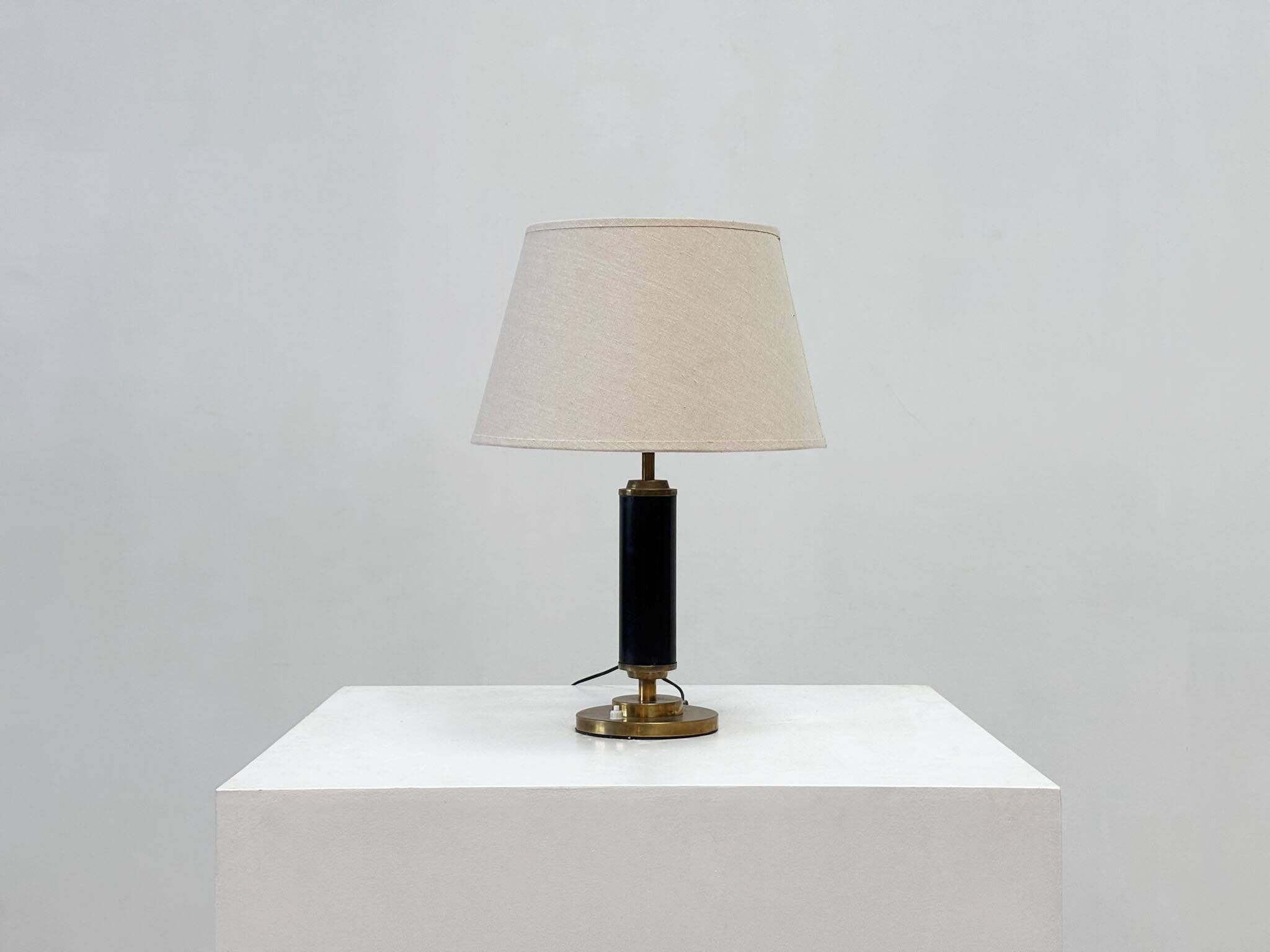 1960s brass and leather French table lamp