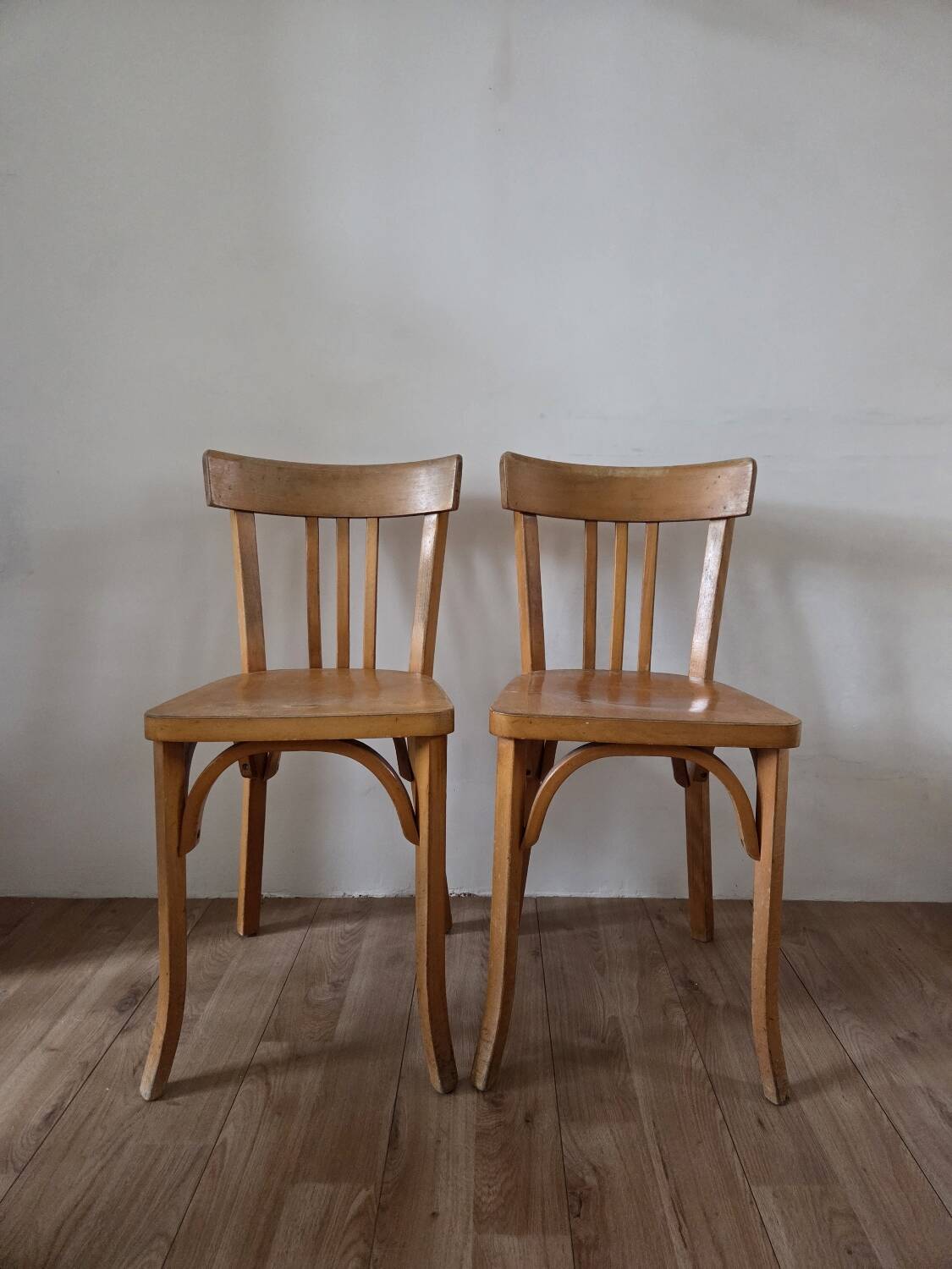 Pair of Baumann bistro chairs