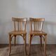 Pair of Baumann bistro chairs