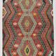 Tapis kilim à décor géométrique rouge et vert olive