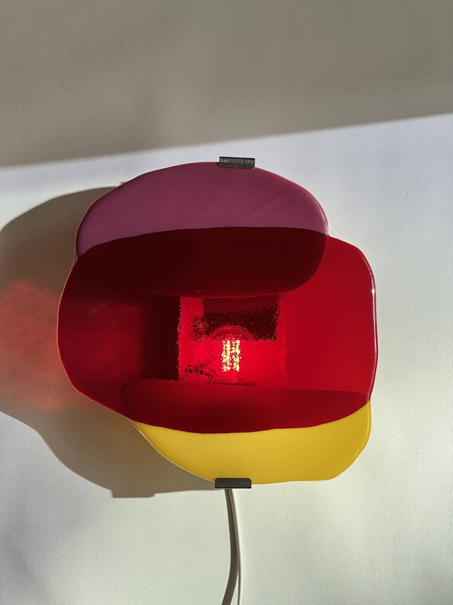 Handcrafted glass wall light