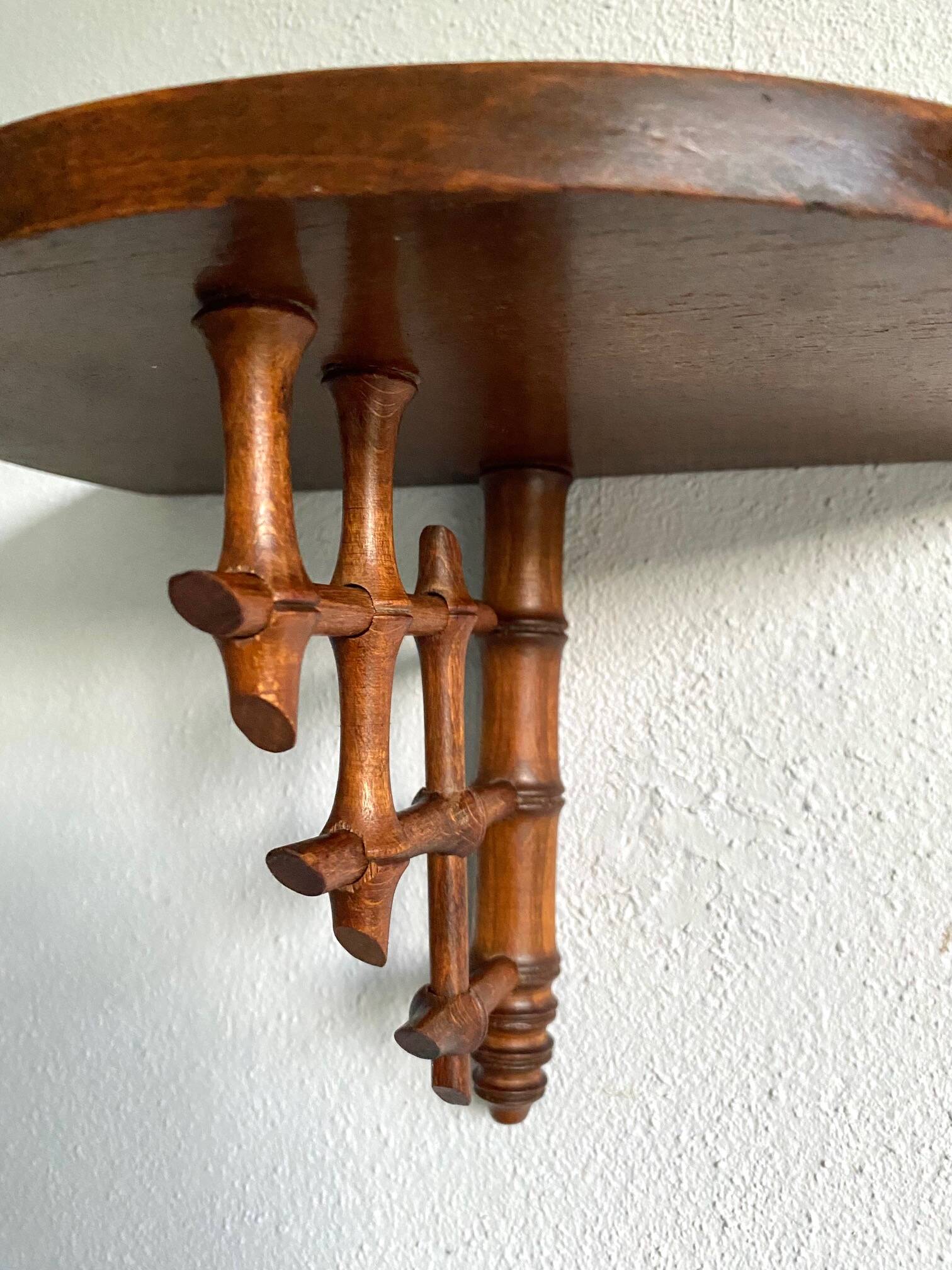 Wooden wall shelf, bamboo sculpture