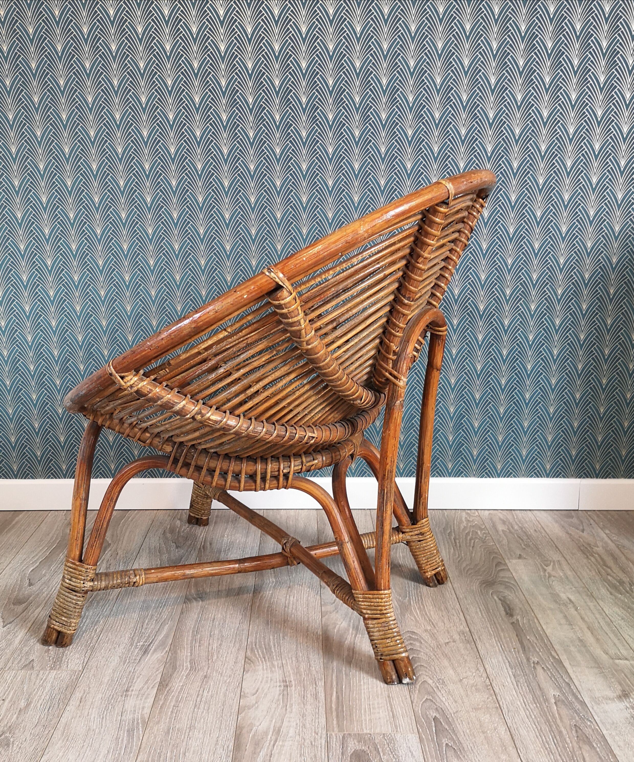 Paire de fauteuils coquille en osier