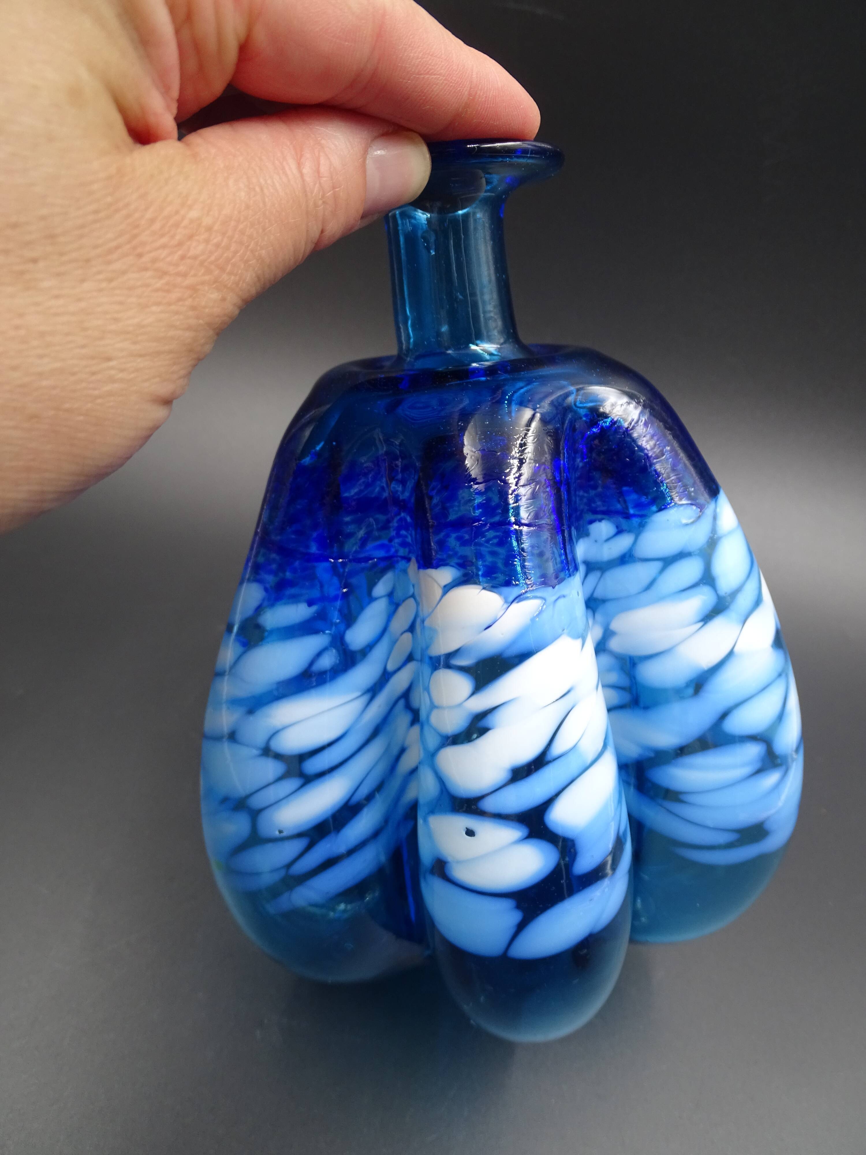 Blue glass vase and touches of white
