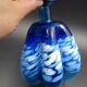 Blue glass vase and touches of white