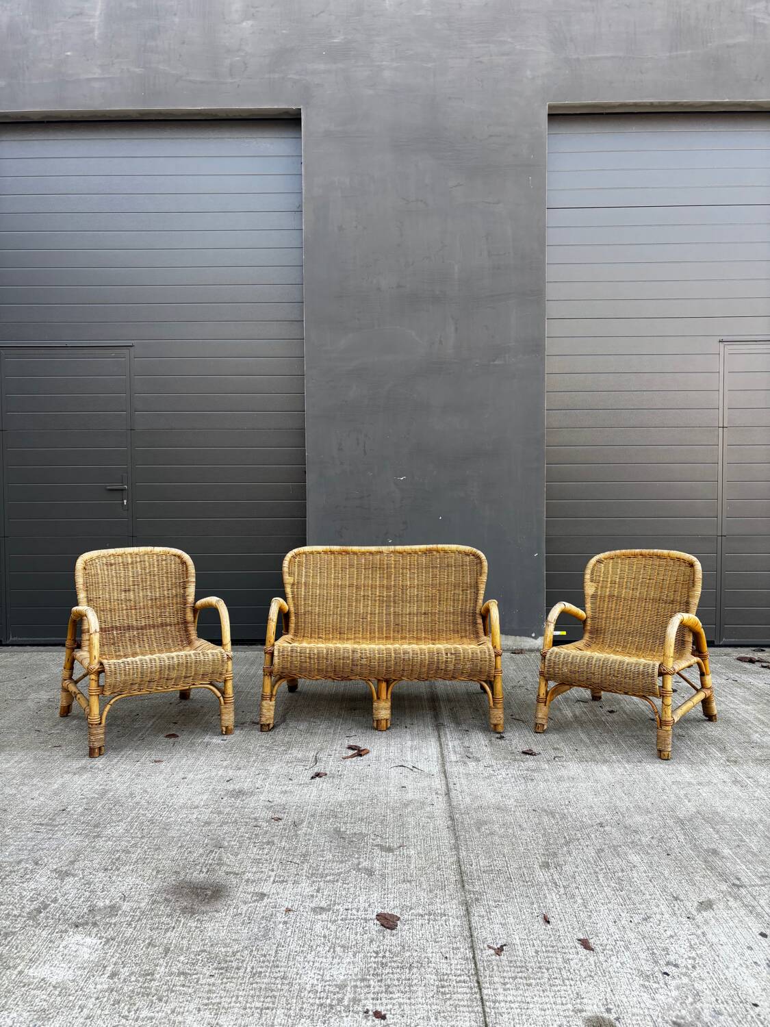 Vintage rattan garden furniture – complete set with sofa and armchairs.