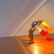 Orange metal table lamp, minimalist, modern mid-century space age, 1960s.