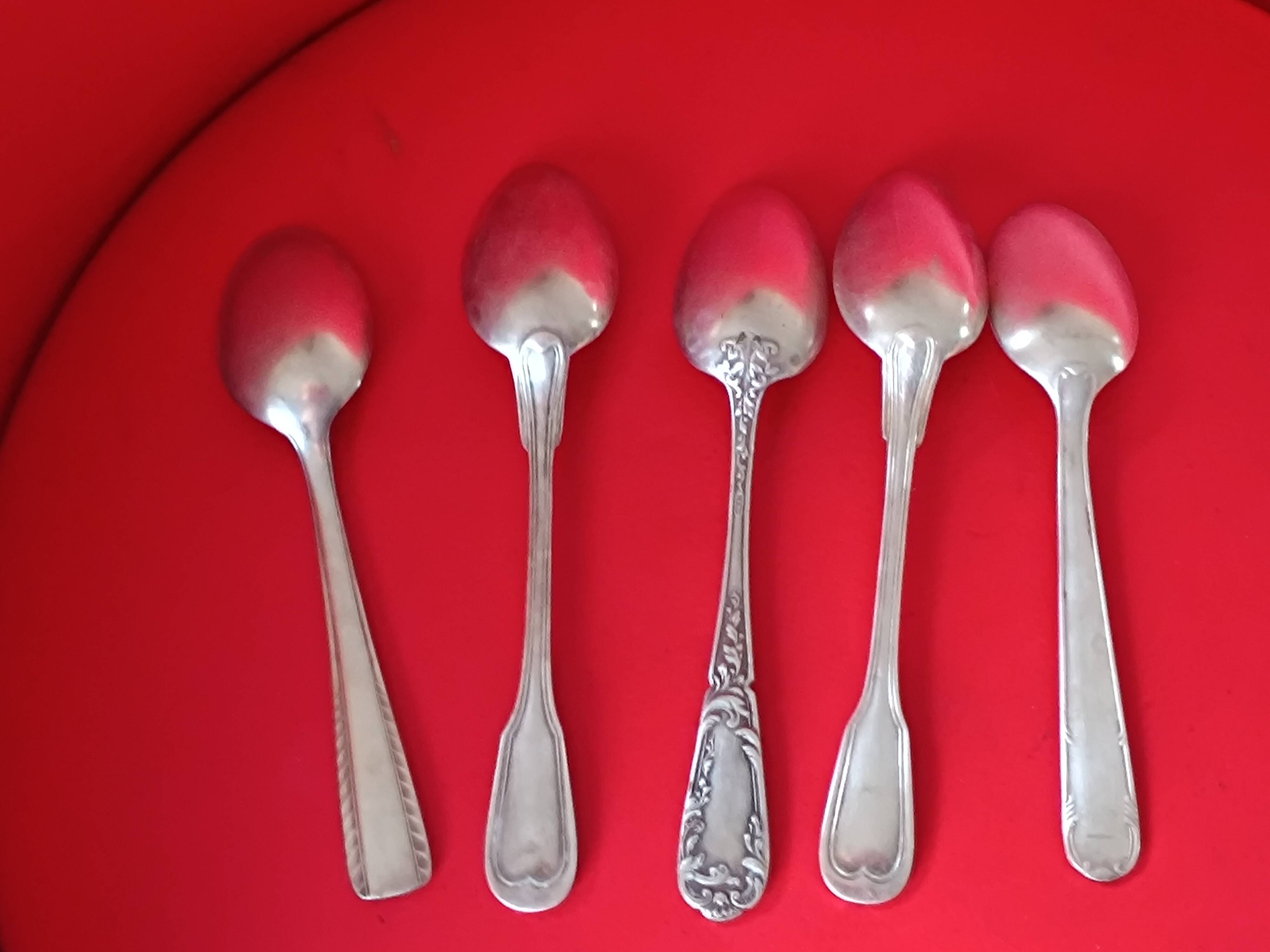 5 Small silver-plated spoons. Various models.