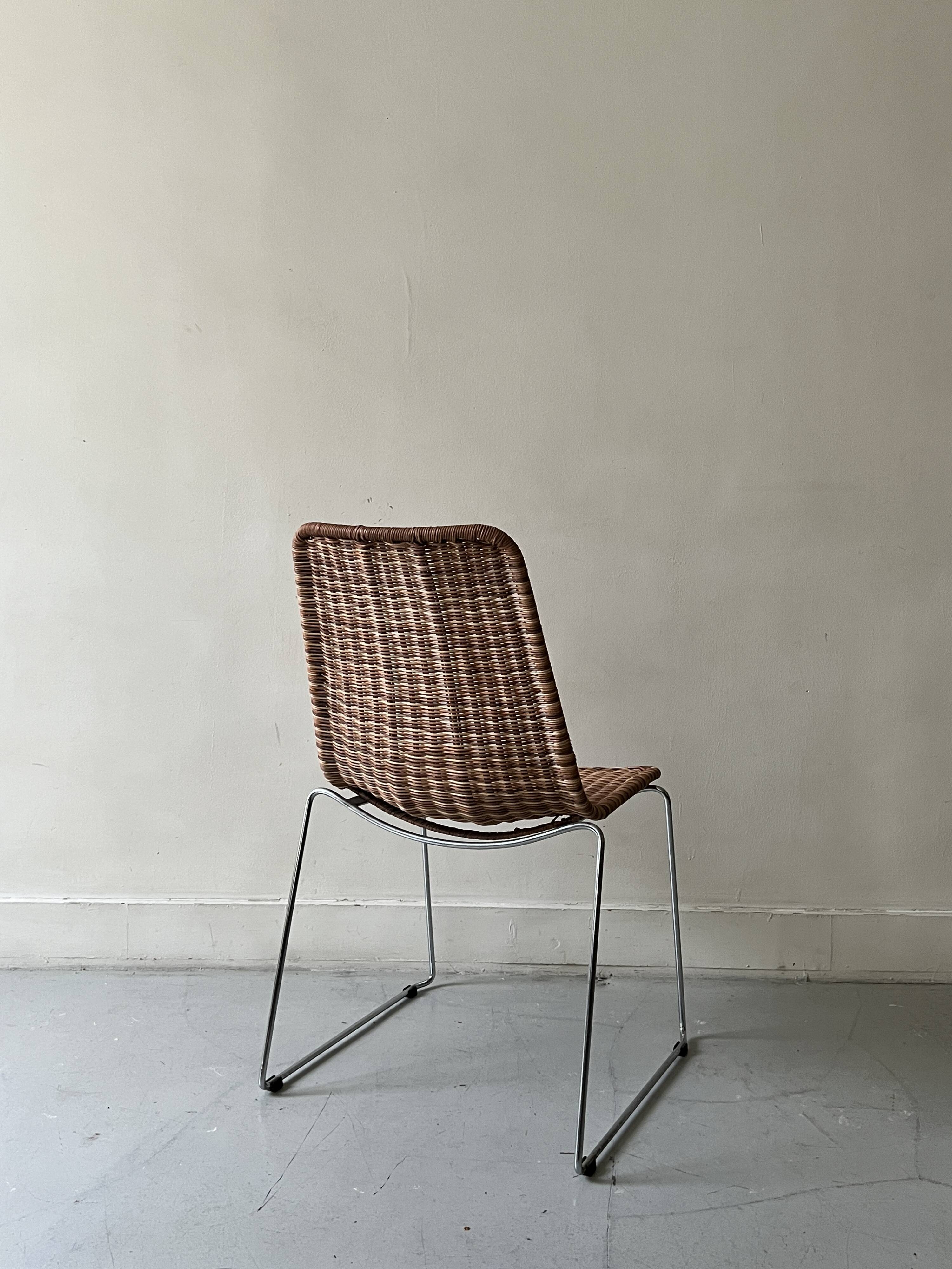 Chair made of rattan, wicker and chrome-plated metal