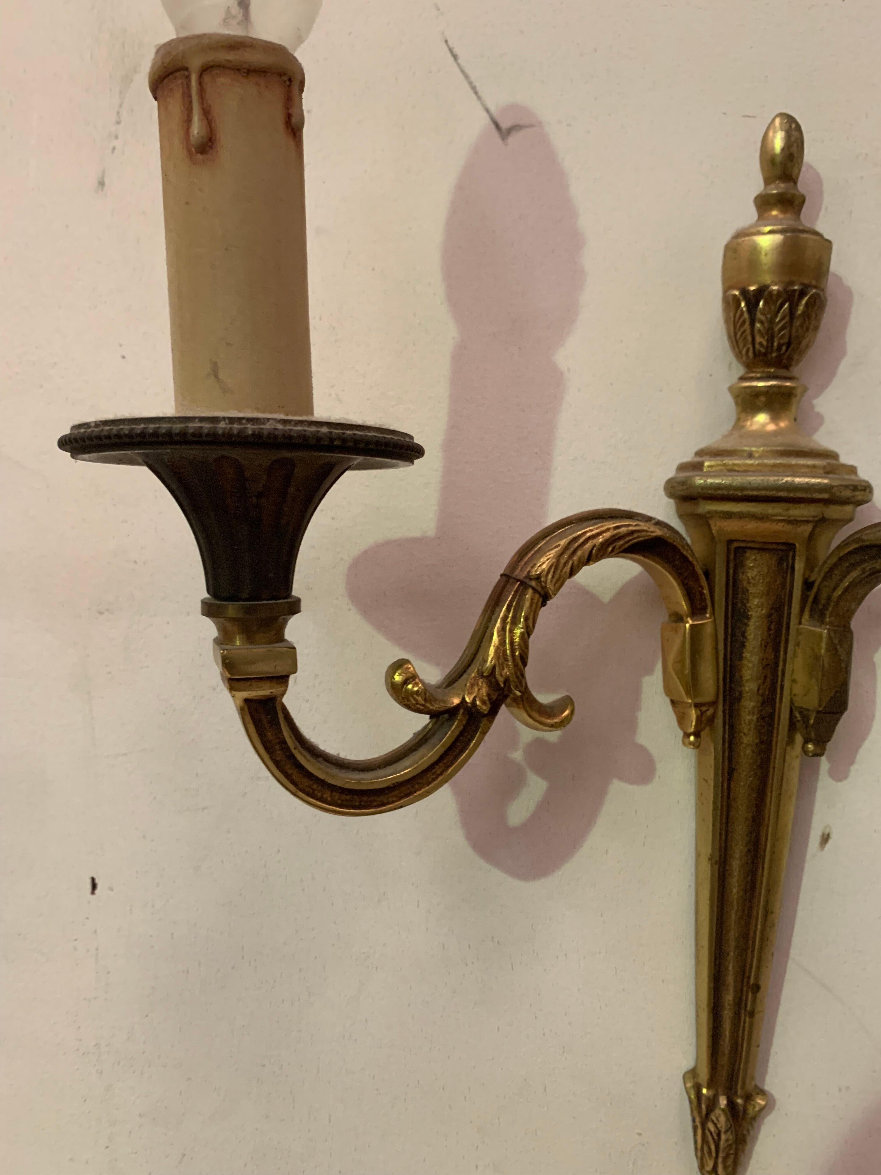 Pair of Louis XV style sconces in gilded bronze XX century