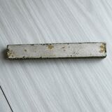 Blue chopsticks decorated with floral motifs.