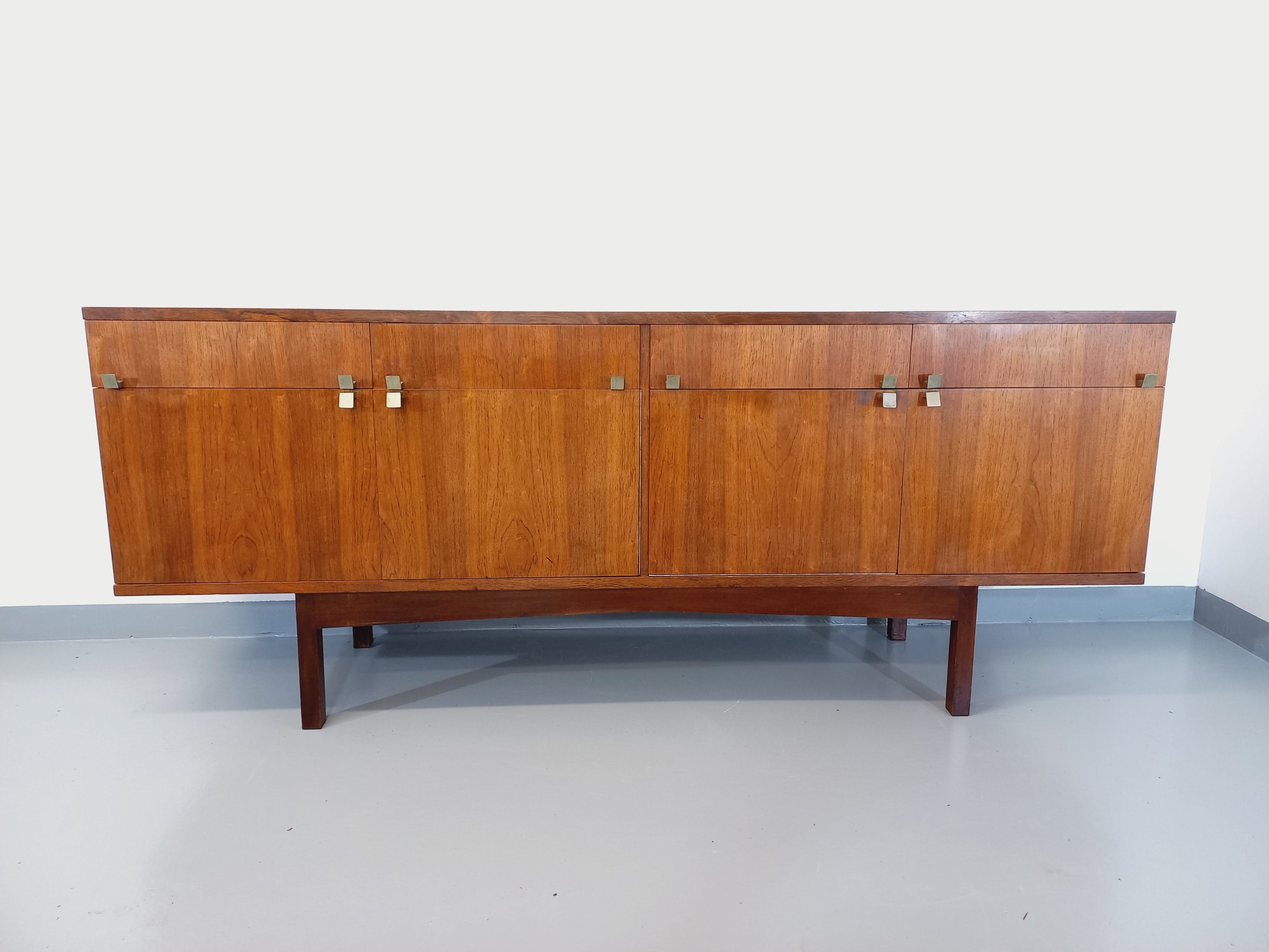 Vintage Scandinavian style row in rosewood and brass from the 60s