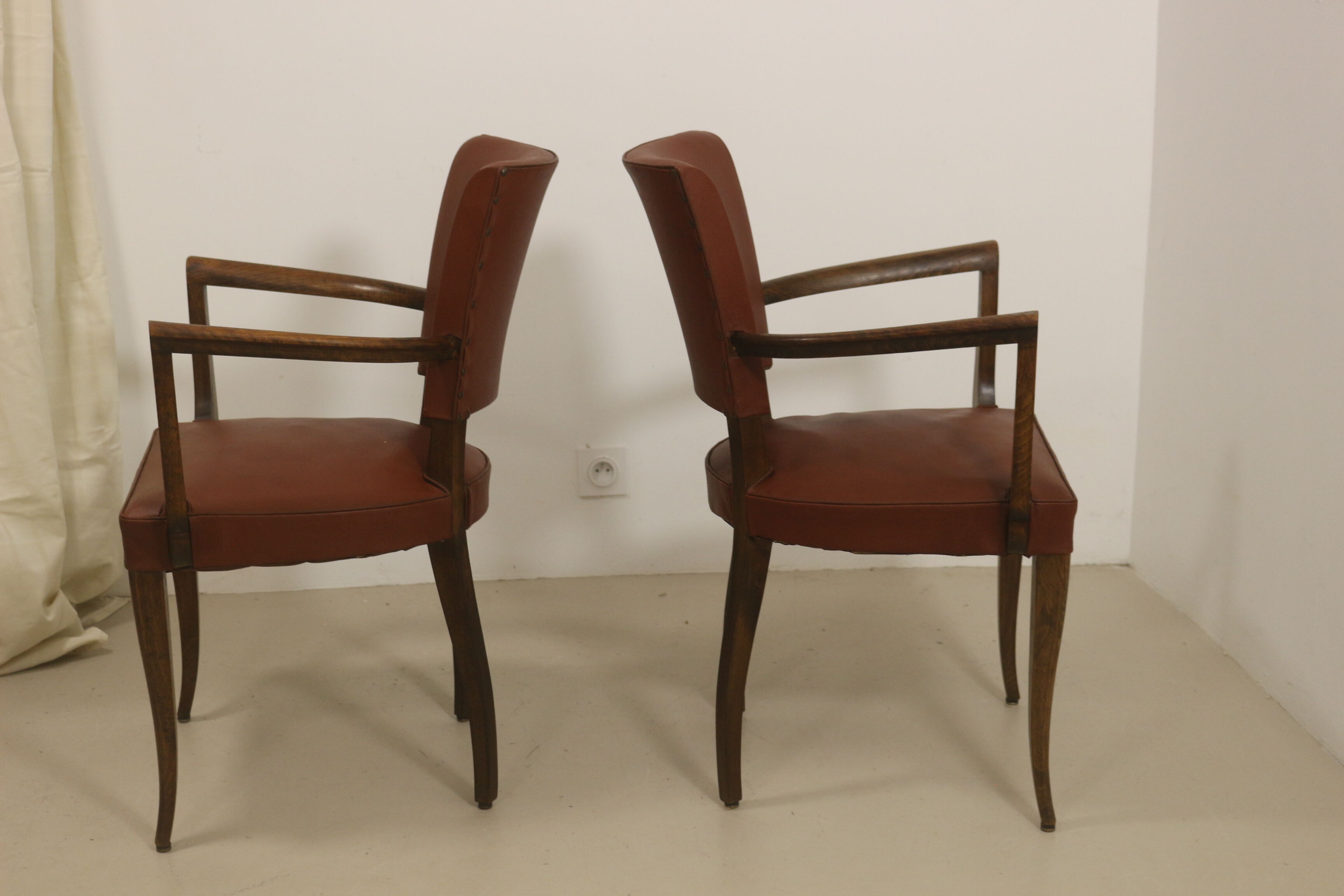 Pair of vintage bridge armchairs year 60 in imitation rust leather.