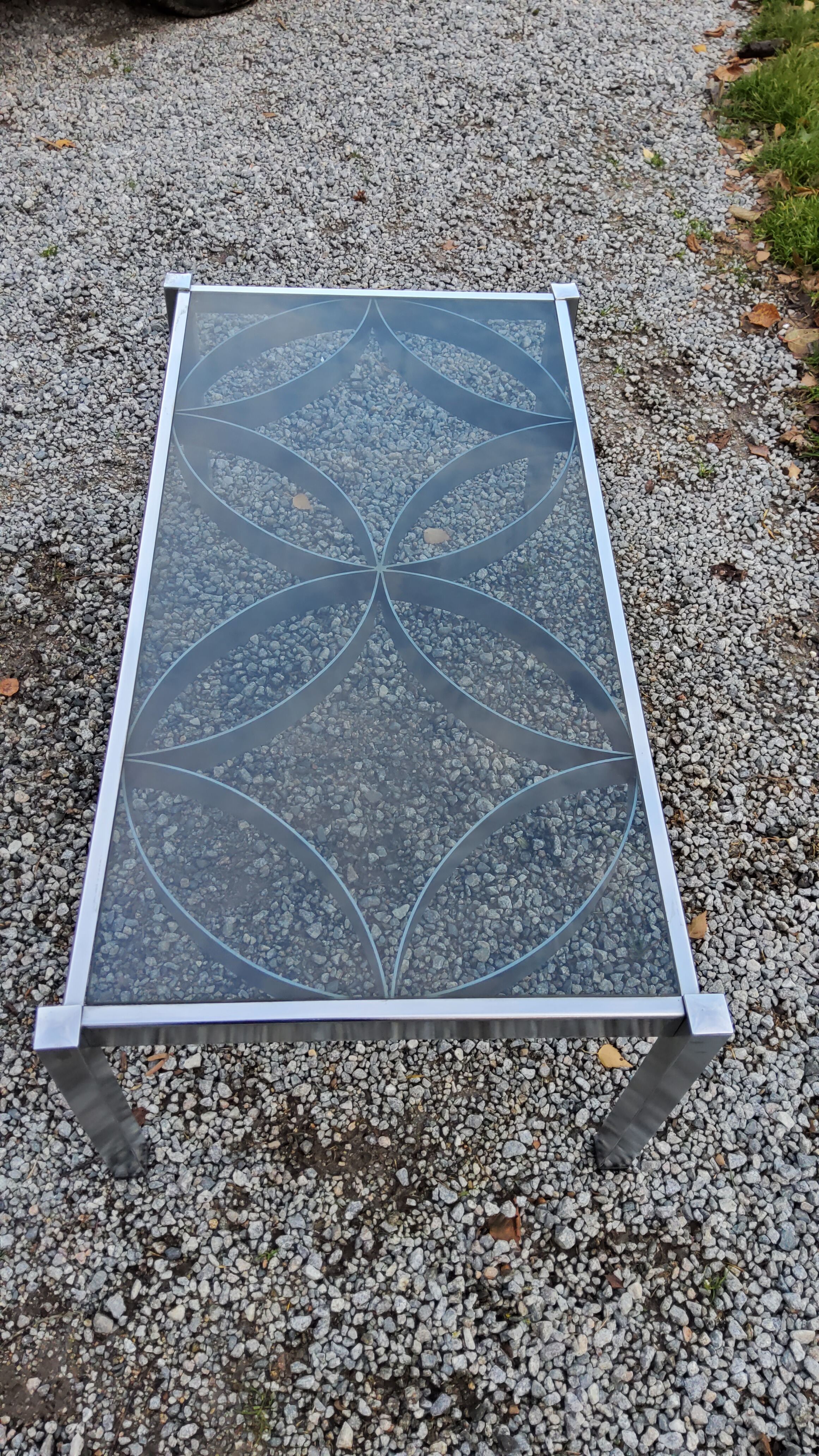 Coffee table from the 70s chrome and smoked glass
