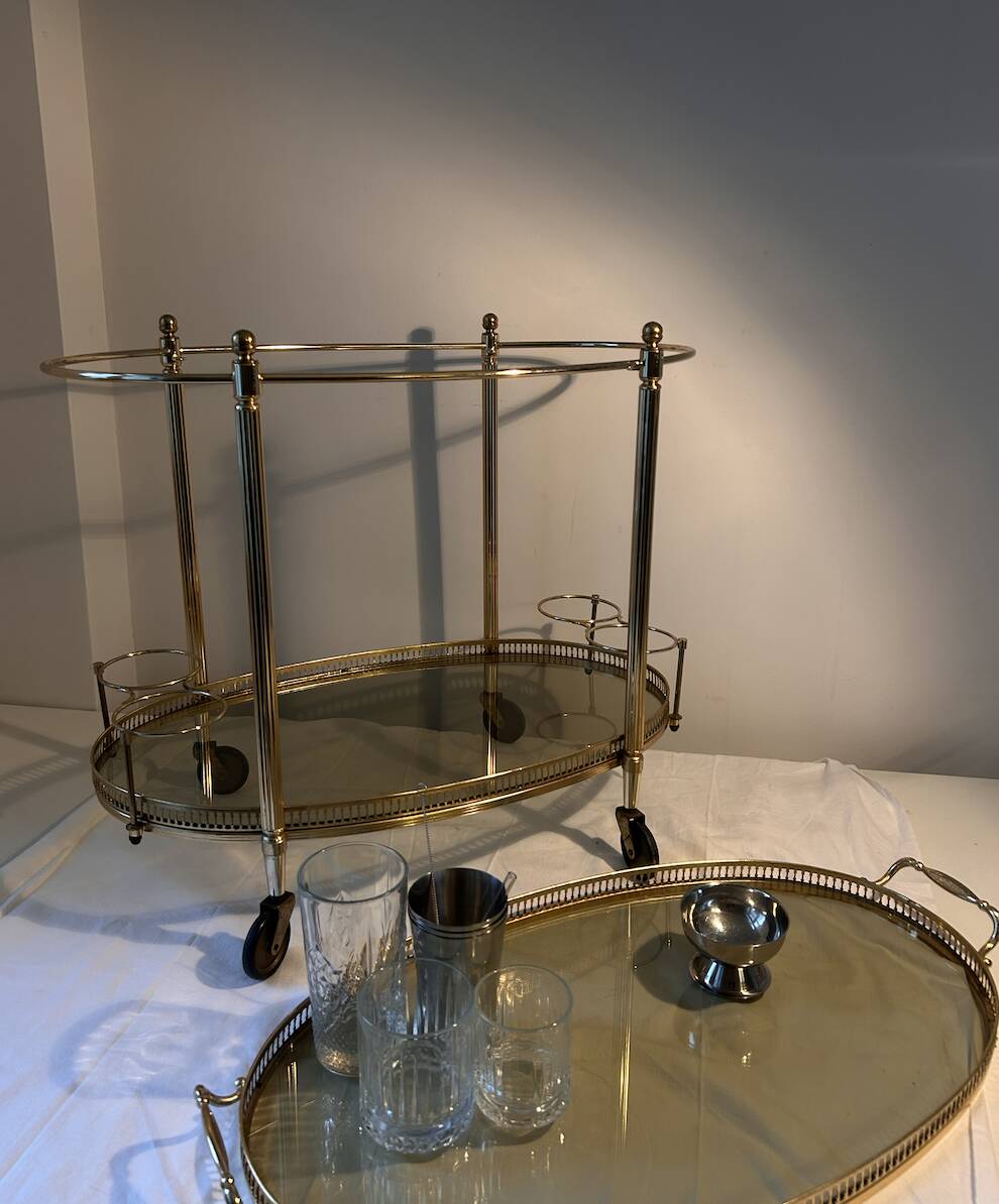 Neoclassical bar cart in gilded brass and smoked glass