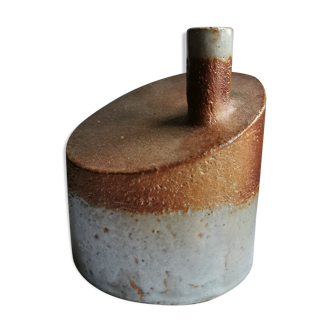 Vase in sandstone, free form, signed