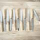 Set de 12 couteaux avec manches effet corne dans leur coffret